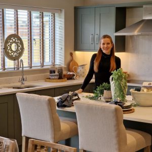 Women standing in kitchen