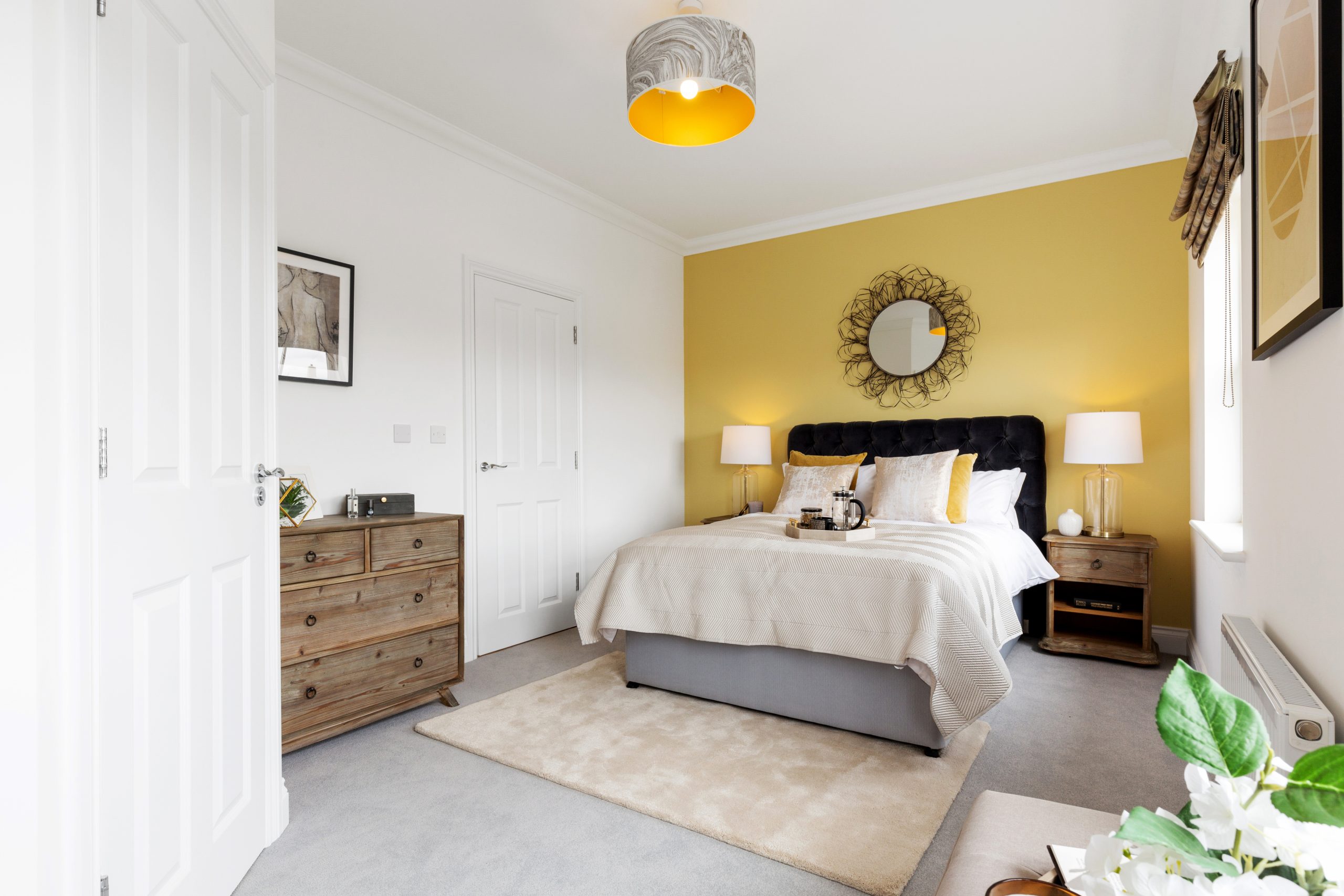 A bedroom at a view home in a Hopkins Homes new build